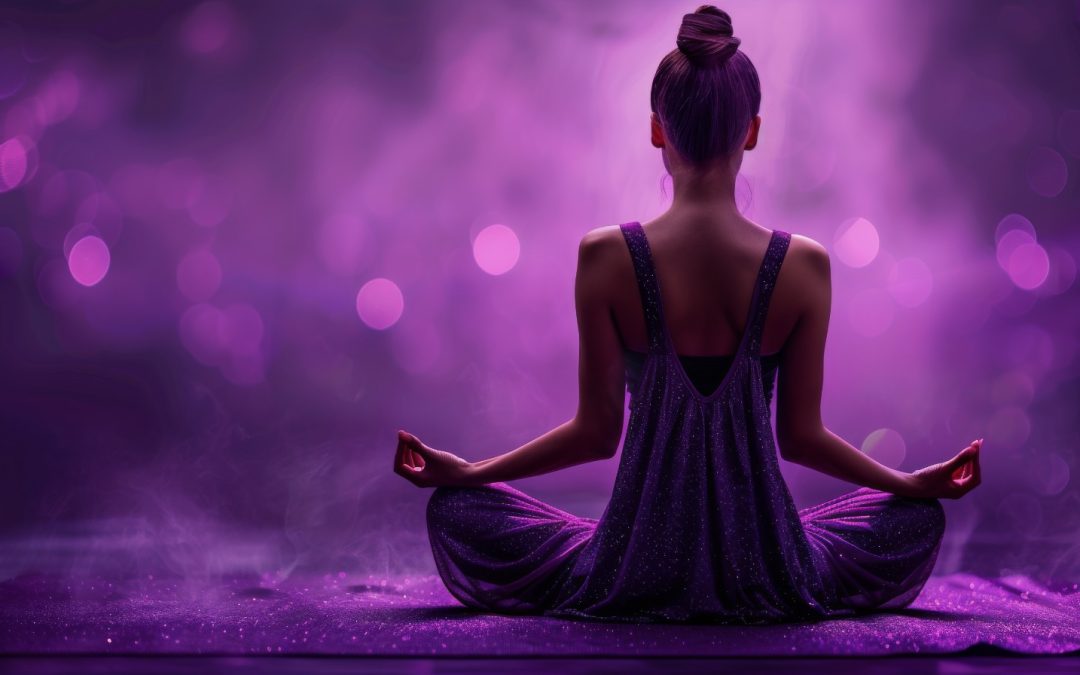 Woman in meditation position facing away